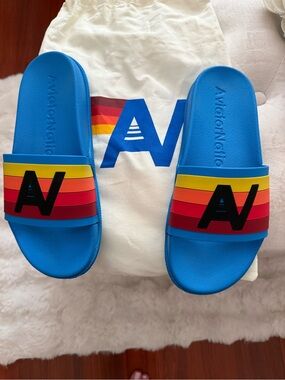 Aviator Nation Bright Blue Slides with Rainbow Stripe Strap